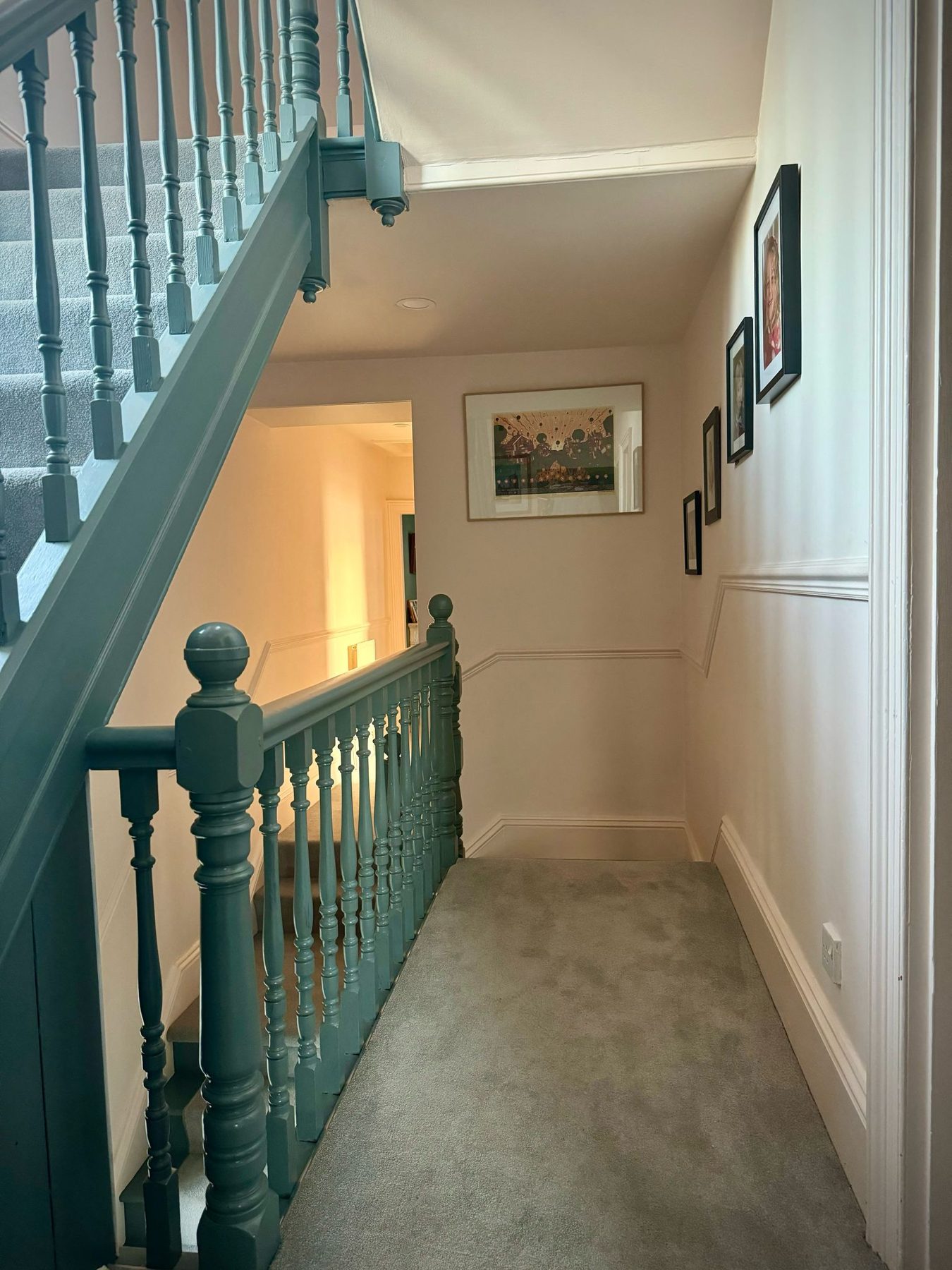 Hallway and teal staircase