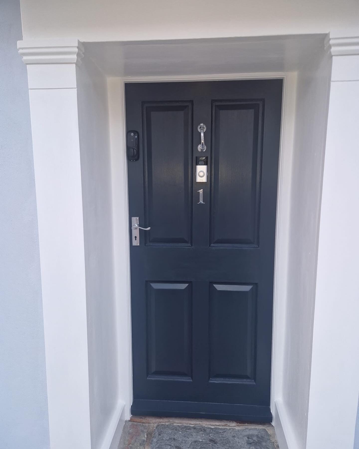 Front door in deep navy