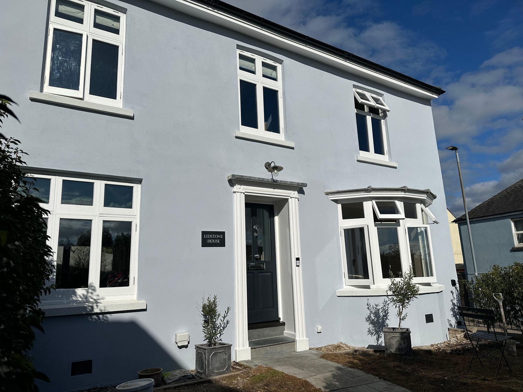 Grey rendered house exterior