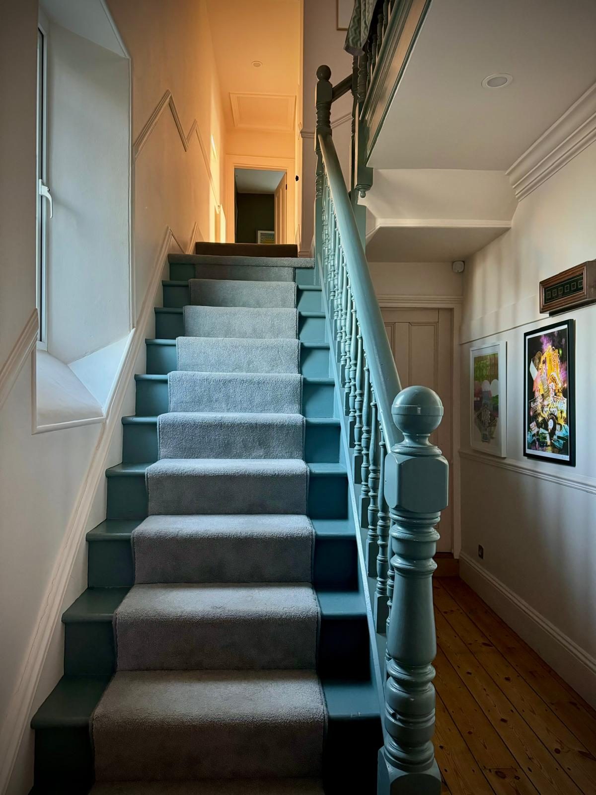 Staircase with painted balustrade